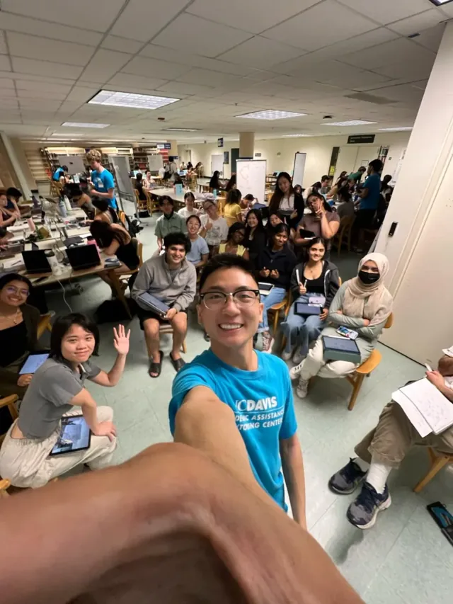 Bryant taking a selfie with students at an Organic Chemistry session.